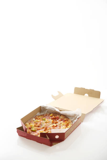 istock pizza , chicken green pepper pineapple in box isolated in white background 878210784