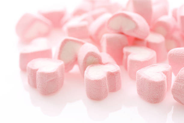 istock Pink Heart marshmallow isolated in white background 878210916