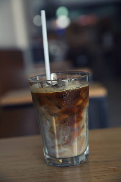istock Iced coffee on wood background 878210992