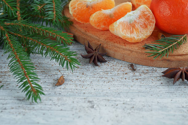 istock Mandarins (tangerines), spices and fir tree branches. 878220876