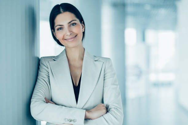 istock Content Pretty Business Woman Relaxing in Hall 878222640