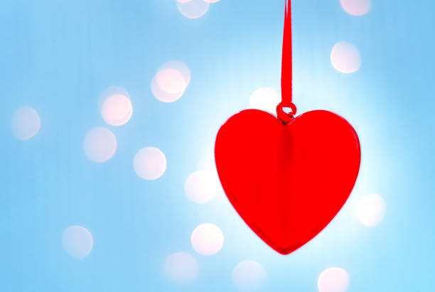 istock Christmas decoration heart on the tree 878233720