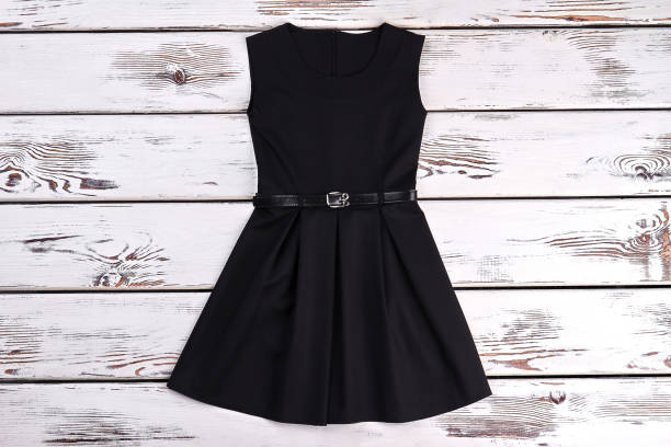 istock Black sleeveles short cotton dress. 878234044