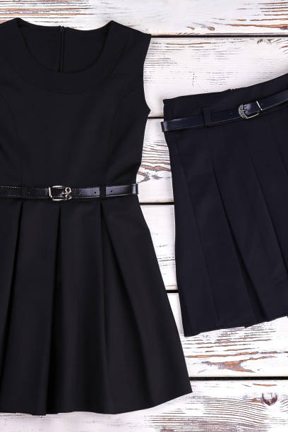 istock Black belted dress and skirt. 878234540