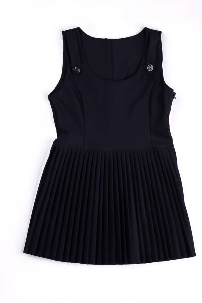 istock Black sleeveless pleated dress. 878234716