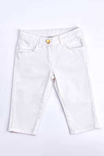 istock Infant baby white cotton trousers. 878240290