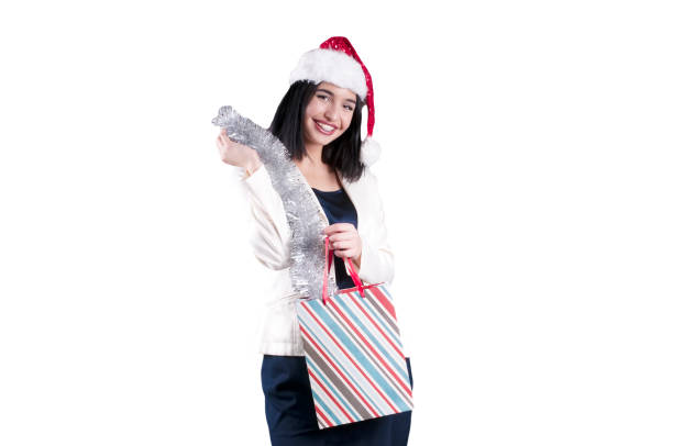 istock beautiful girl hat santa gift bag 878246846