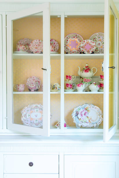 istock Colorful bowls on a vintage kitchen shelf 878251714