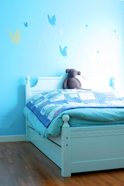 istock blue tones bedroom with bear 878251988
