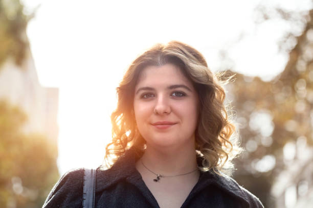 istock Real caucasian young woman portrait 878255802