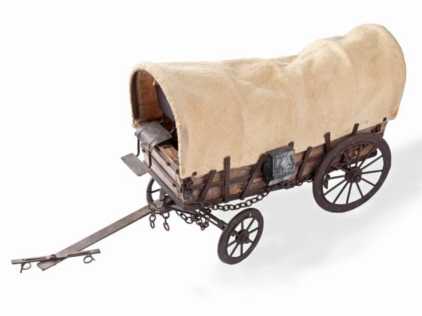 istock A covered wooden wagon with a canopy 878260606
