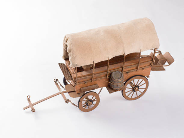 istock A covered wooden wagon with a canopy 878265526