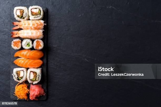 Overhead Shot Of Japanese Sushi On Black Concrete Background Stock Photo - Download Image Now