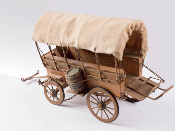 istock A covered wooden wagon with a canopy 878265596