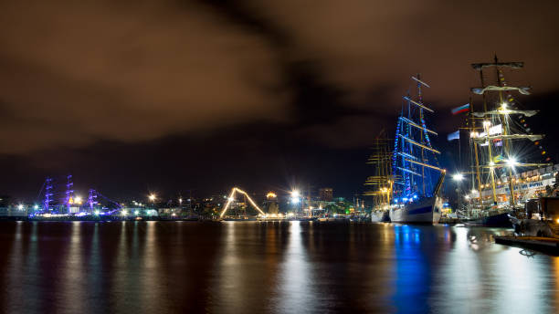 istock Varna's Harbor with sailing ship by night 878269404