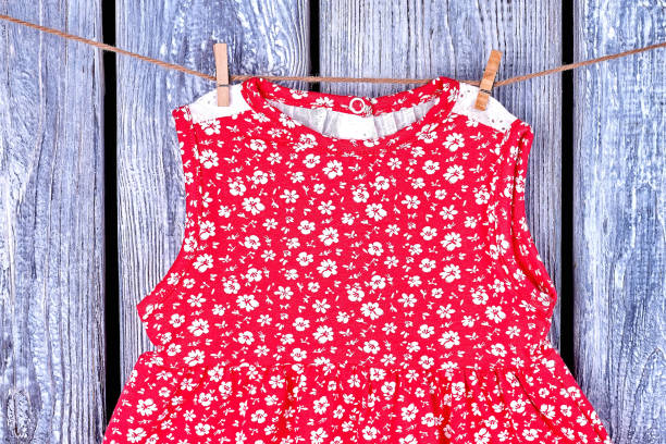 Infant girl sundress on rope.