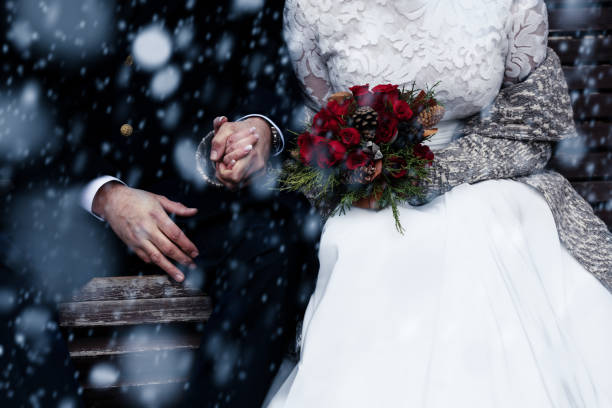 happy bride and groom enjoying romantic moments outdoors. wedding couple.winter concept. - snow winter bench park imagens e fotografias de stock