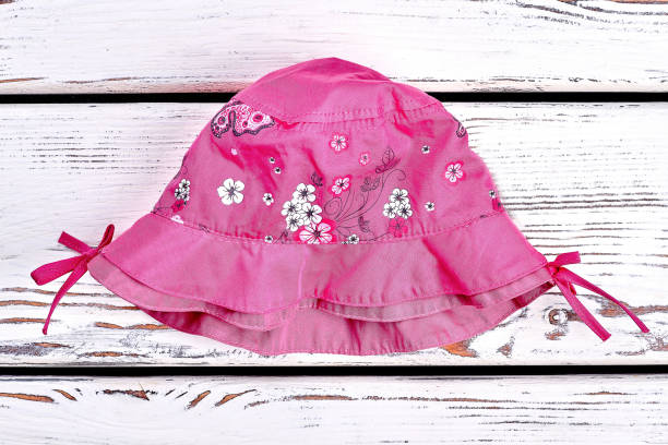 beautiful baby in a pink hat.
