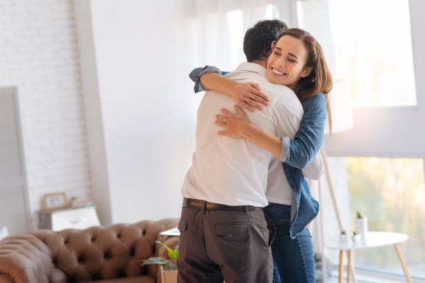 istock Excited loving wife hugging her kind supporting husband 878298250