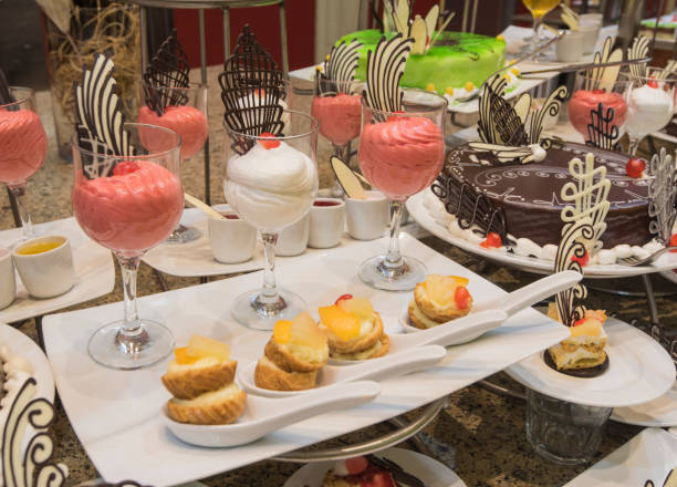 Selection of desserts on display at a restaurant buffet