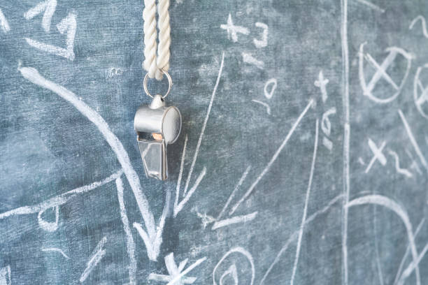 istock whistle of a soccer coach with strategy drawing 878339280