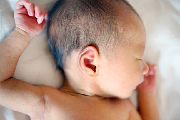 istock Sleeping Asian newborn baby 878339844