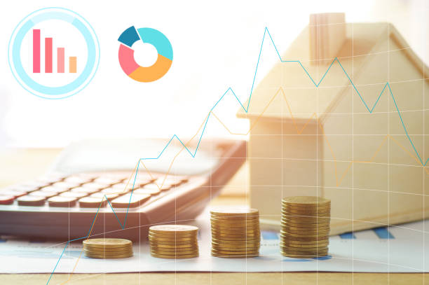 istock house  and finance  with calculator with graph line and paper 878340618