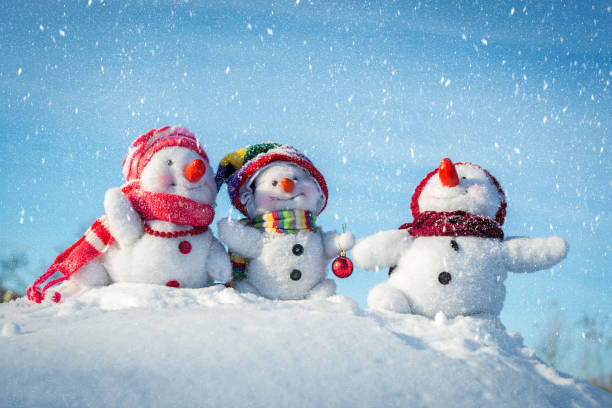 Happy snowman family stock photo