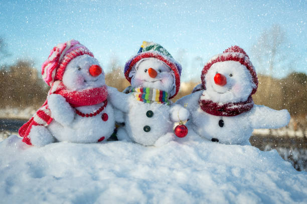 Happy snowman family stock photo