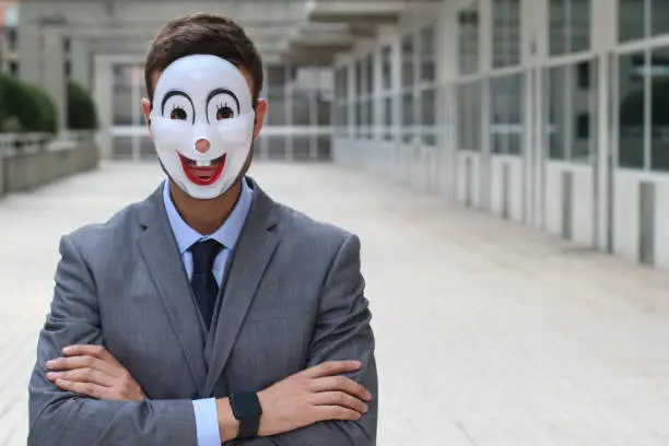 Photo of Scary businessman wearing a mask