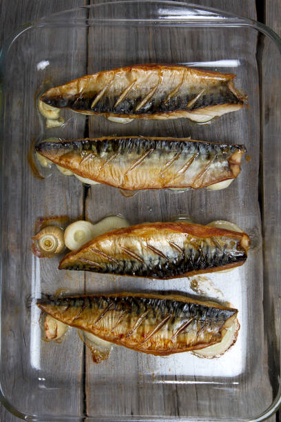 istock Mackerel fillet on onion rings after baking 878361530