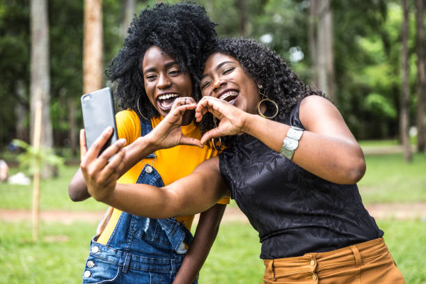 Afro women descent taking selfie photos in the park People collection cameroon photos stock pictures, royalty-free photos & images
