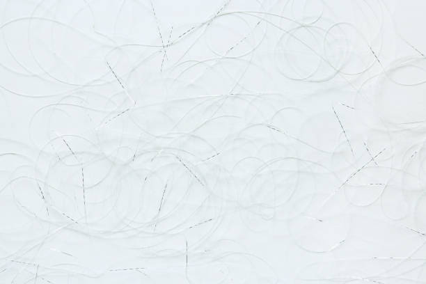 Abstract white silver thread pattern. Background with abstract graphic line of silver white thread. sewing thread rolled up creation stock pictures, royalty-free photos & images