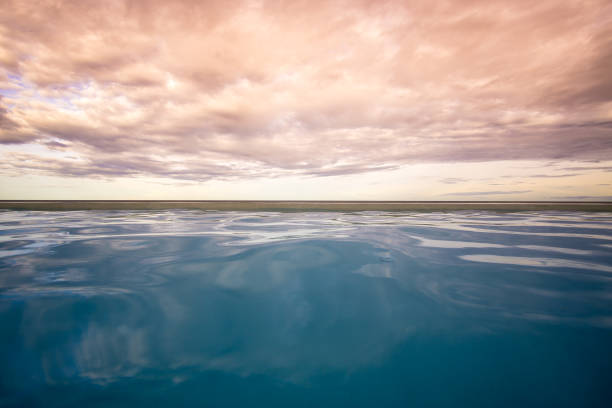 istock Swimming Pool with the sea 878379530