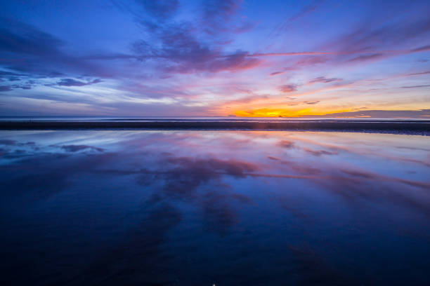 istock Beautiful tropical sunrise on the beach 878381658