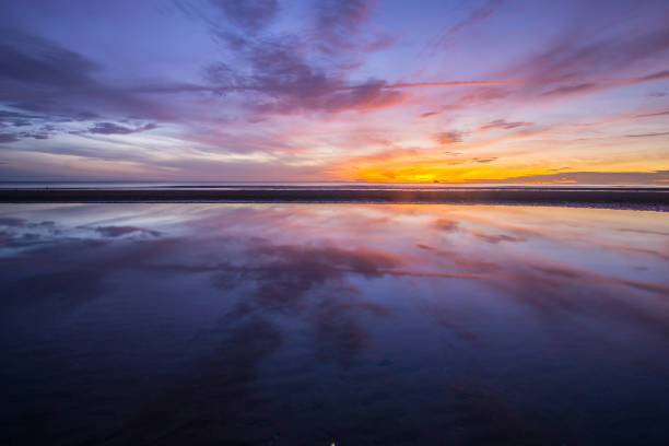 istock Beautiful tropical sunrise on the beach 878381660