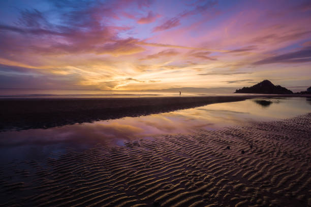 istock Beautiful tropical sunrise on the beach 878386092