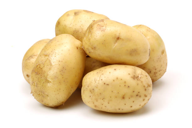 istock Potatoes   isolated on the white background 878395710