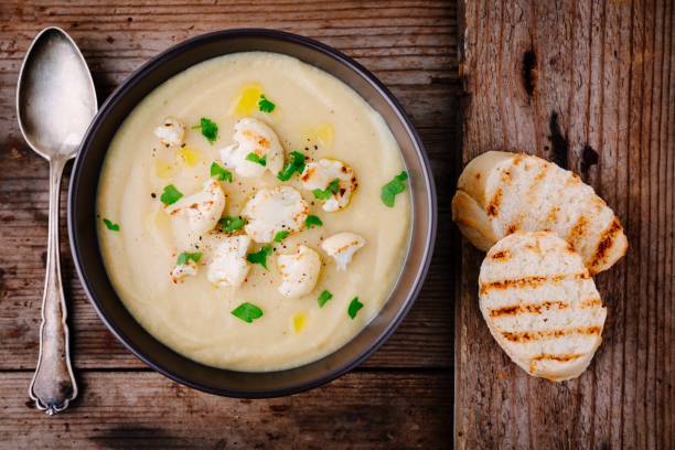 istock cauliflower cream soup with fried cauliflower and toasts 878395776