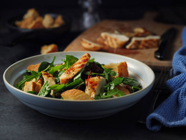 Healthy bistro salad with grilled chicken breast stock photo