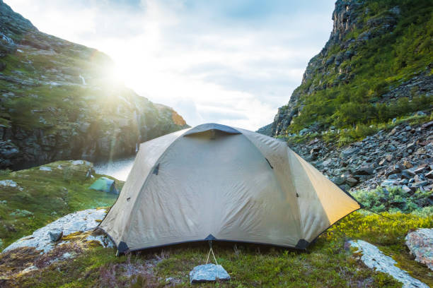 istock tourist tent in mountains summertime sunset Norway 878402434