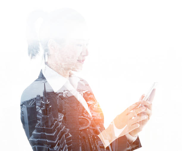 istock Multiple exposure of businesswoman using mobile phone 878405528