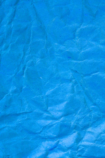 istock Texture crumpled blue paper background. 878405660