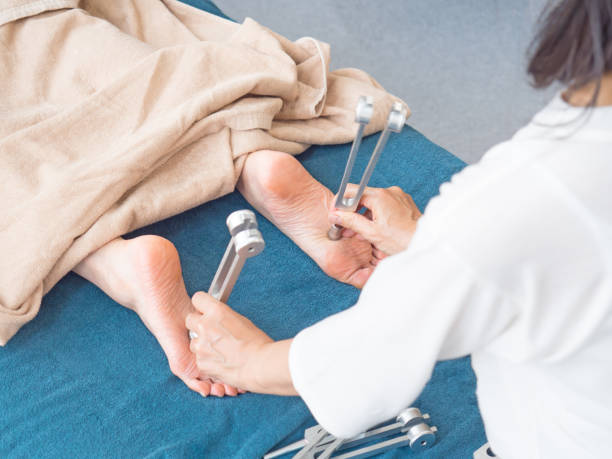 istock Unrecognizable person recieving tuning fork therapy 878405702