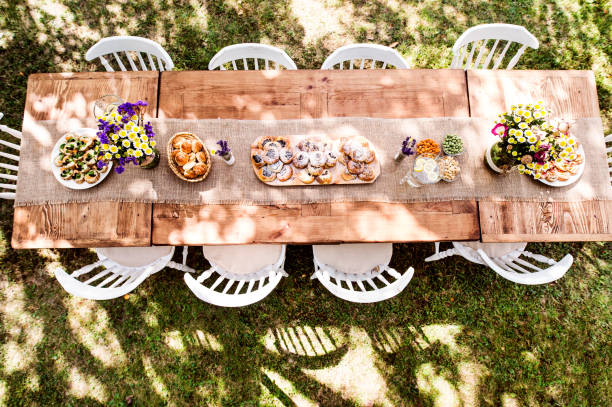 Wooden table and benches in the garden. Garden furniture for outdoor recreation.