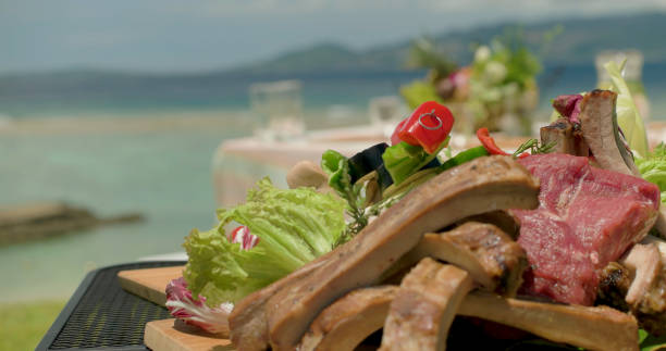 istock Meat and vegetable food on the table. 878413244