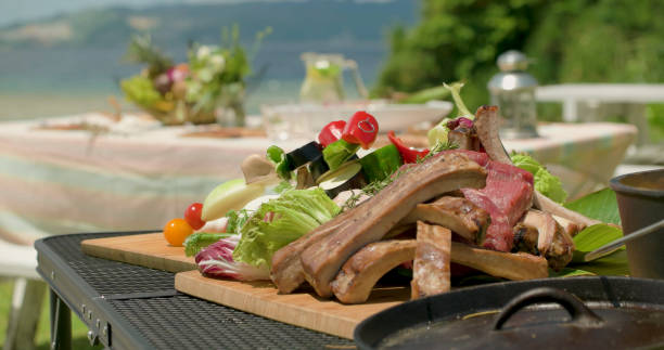 istock Food on the table at the beach. 878413284