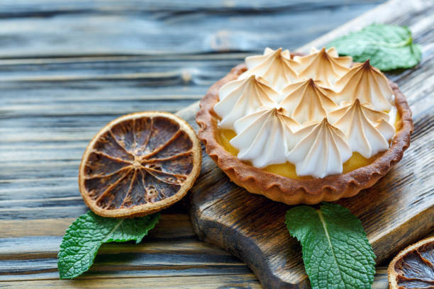 istock Tartlet with lemon cream and meringue. 878413950