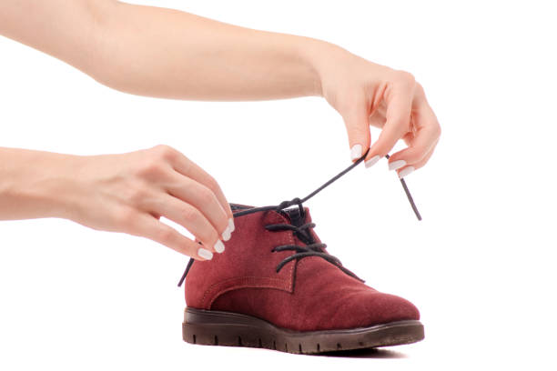 istock Shoes hold on to the laces 878425996