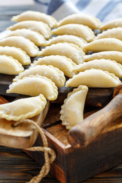 istock Ready for cooking dumplings with cottage cheese. 878426316